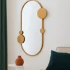Lustro ścienne SAANA z geometrycznymi zdobieniami, 50 x 76 cm