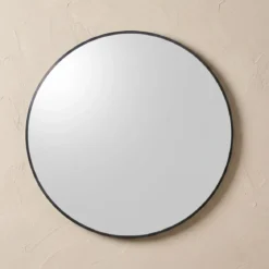 Okrągłe lustro ścienne w metalowej ramie, Ø 70 cm, czarne