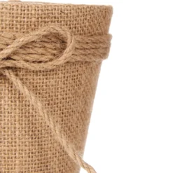 Osłonka na doniczkę pleciona z jutową kokardą, Ø 13 cm