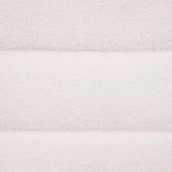 Pufa do salonu Sinan, materiał z efektem boucle, 100 x 40 cm
